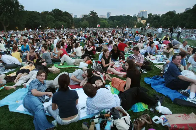 People waiting for the NY Philharmonic in Central Park in years past